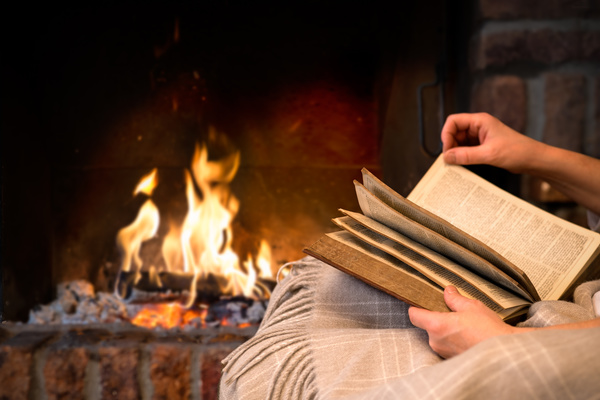 The fireplace reading Stock Photo