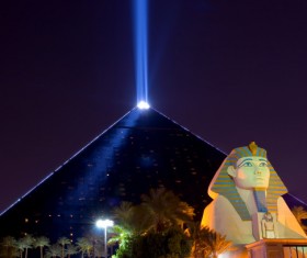 The modern pyramid of light technology and the Sphinx Stock Photo