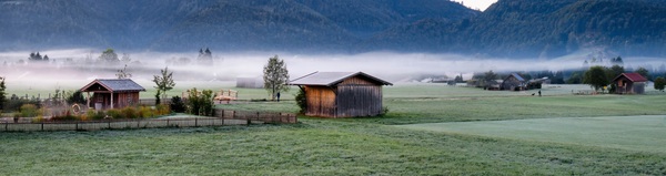 The wooden house on the plain Stock Photo