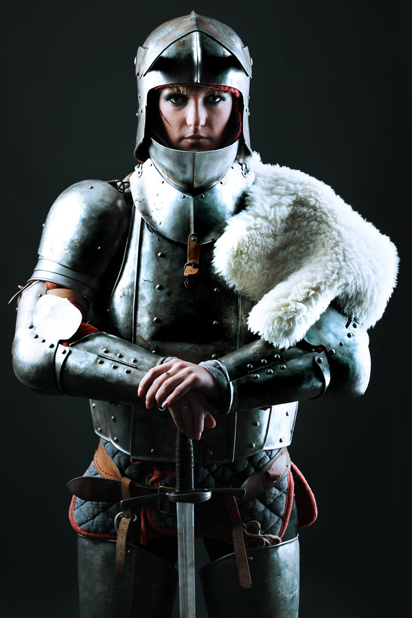 Wearing a armor of the female knight Stock Photo