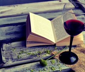 Wine and open book Stock Photo