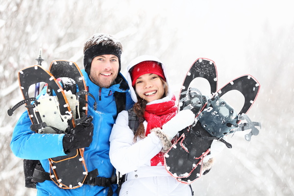 Winter smiling couple hikers Stock Photo