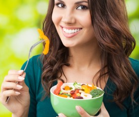 Woman holding vegetable salad Stock Photo