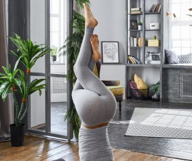 Woman practicing yoga in the living room Stock Photo 20