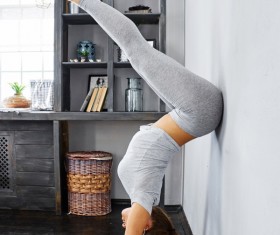 Woman practicing yoga in the living room Stock Photo 23