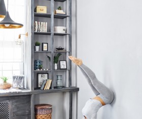 Woman practicing yoga in the living room Stock Photo 24