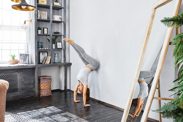 Woman practicing yoga in the living room Stock Photo 25