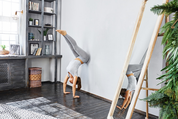 Woman practicing yoga in the living room Stock Photo 26