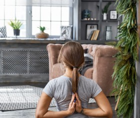 Woman practicing yoga in the living room Stock Photo 28