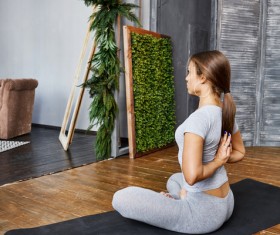 Woman practicing yoga in the living room Stock Photo 29