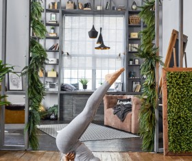 Woman practicing yoga in the living room Stock Photo 31