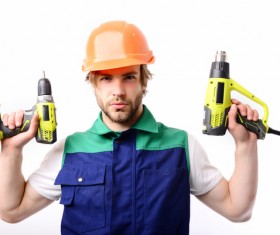 male worker with an electric drill Stock Photo