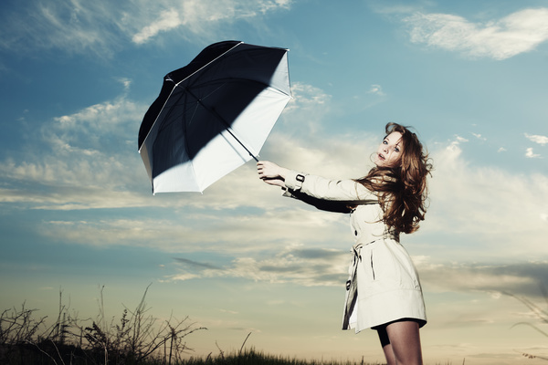 A woman with an umbrella on a rainy day Stock Photo 03