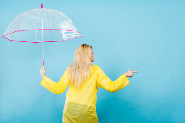 A woman with an umbrella on a rainy day Stock Photo 05