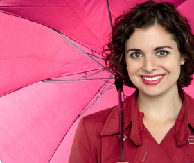 A woman with an umbrella on a rainy day Stock Photo 06