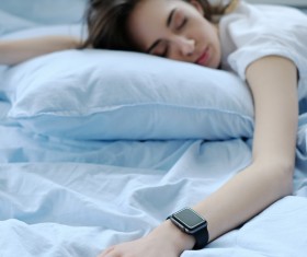 A young girl resting on the bed Stock Photo 06