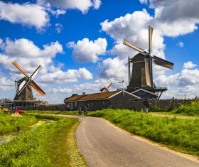 Blue sky under the windmill and road Stock Photo