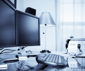 Computer and desk lamp on your desktop Stock Photo