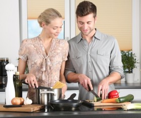 Cooking in the kitchen couple Stock Photo