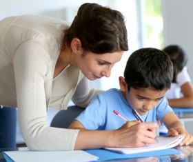 Counseling students writing teacher Stock Photo