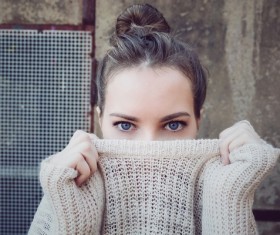 Cover the face of the girl with clothes Stock Photo