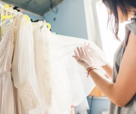 Customers pick clothes Stock Photo