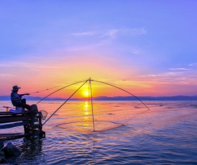 Dawn fishing people Stock Photo