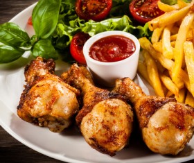Delicious fried chicken and french fries with tomato sauce Stock Photo