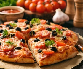 Delicious tomato lemon pizza Stock Photo