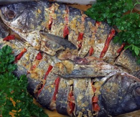 Dish of fish stew with parsley Stock Photo
