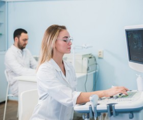 Doctors do B-ultrasound for patients Stock Photo
