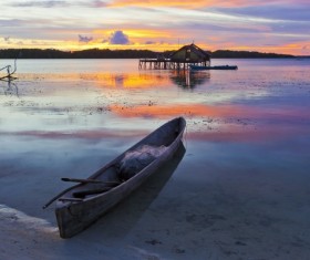 Dusk under the lake parked by the boat Stock Photo
