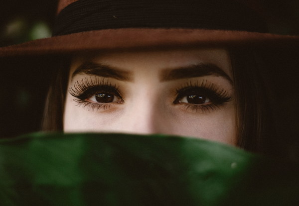 Exposing the eyes of the woman Stock Photo