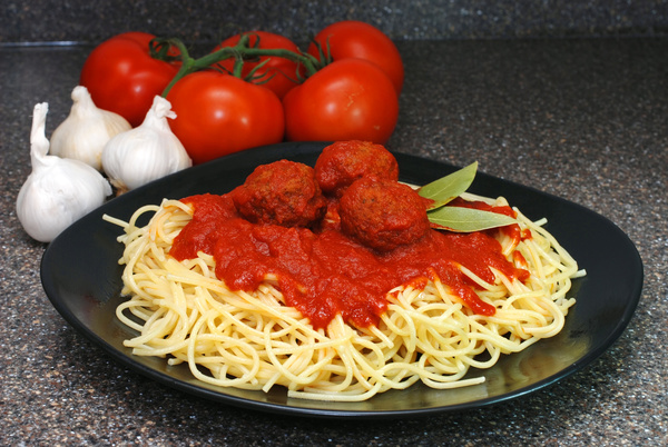 Garlic tomatoes with meatballs spaghetti Stock Photo