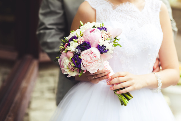 Hand holding bouquet of bride Stock Photo 02
