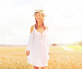 Happy woman in the wheat field Stock Photo 01