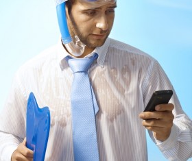 Man wearing diving equipment with phone calls Stock Photo