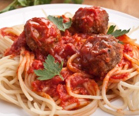 Meatball pasta and vegetables on the table Stock Photo