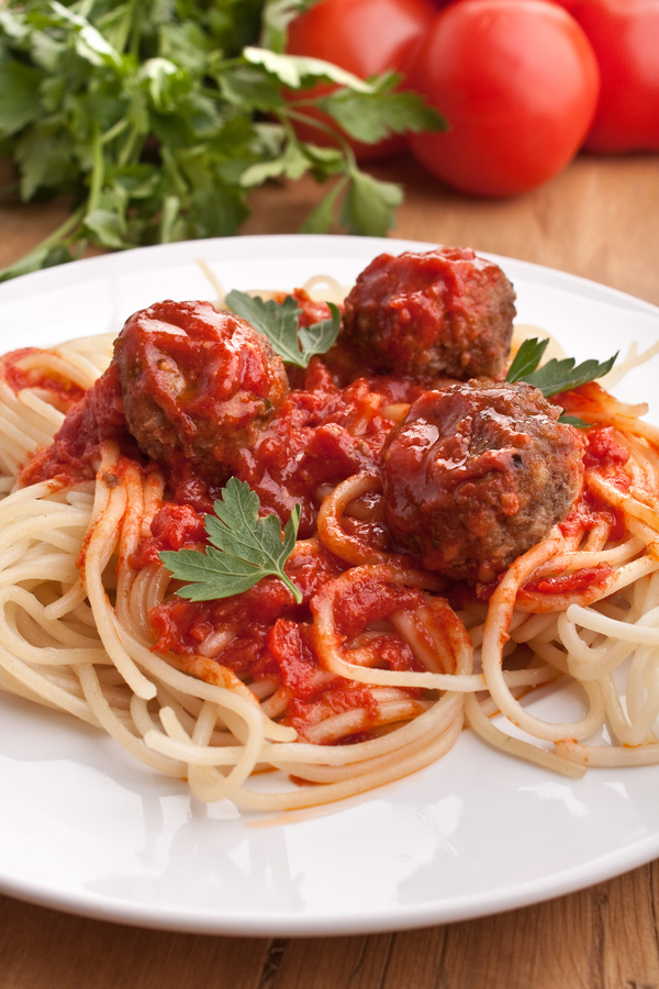 Meatball pasta and vegetables on the table Stock Photo