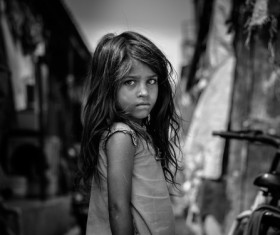 Melancholy eyes of a little girl Stock Photo