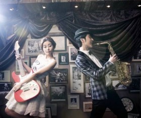 Men and women playing musical instruments Stock Photo