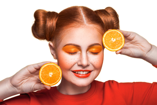 Orange cosmetics young girl holding orange 07
