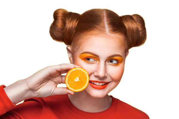 Orange cosmetics young girl holding orange 09