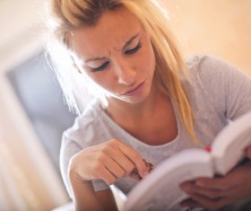 Reading a woman Stock Photo
