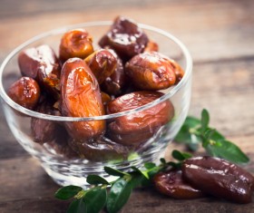 Red dates on the table Stock Photo