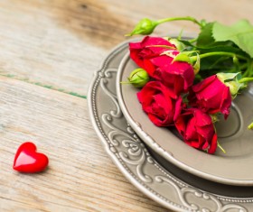 Red rose in the plate Stock Photo