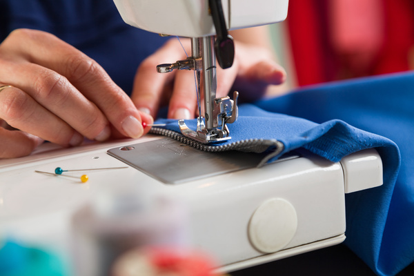 Sewing machine making clothes Stock Photo 01