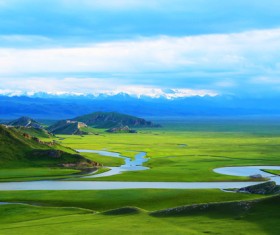 Snowy mountains under the beautiful river of the plateau Stock Photo