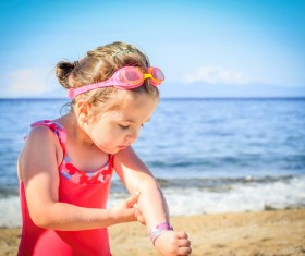 Summer little girl on the beach Stock Photo