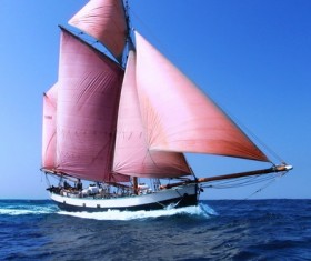 The blue sea sails the sail Stock Photo